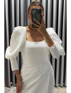 Black Sheath Dress With Stretch Fabric Ruched Details For Elegant Evening Gown With Asymmetrical Three Quarter Sleeve