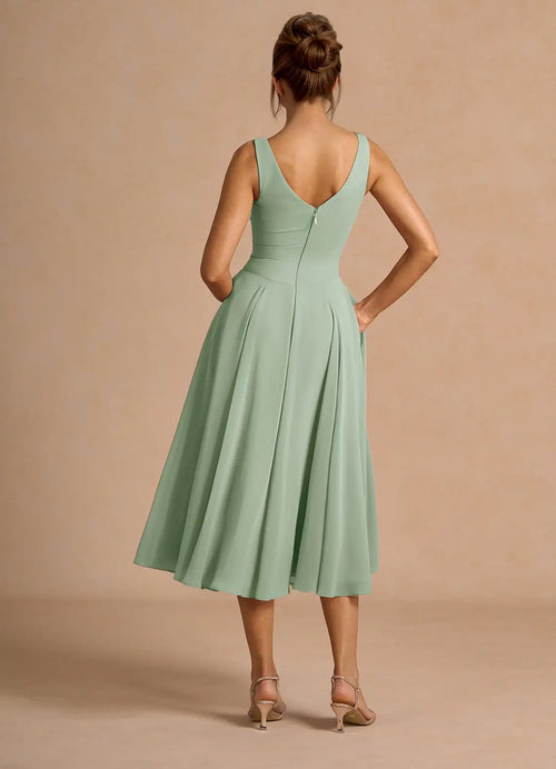 Robe de bal trapèze fluide mi-longue sans manches décolleté en V devant et dos