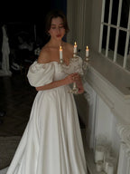 Elegant Satin A Line Off Shoulder Puff Sleeve Wedding Dress With Long Train For Modern Brides