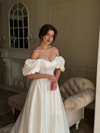 Elegant Satin A Line Off Shoulder Puff Sleeve Wedding Dress With Long Train For Modern Brides