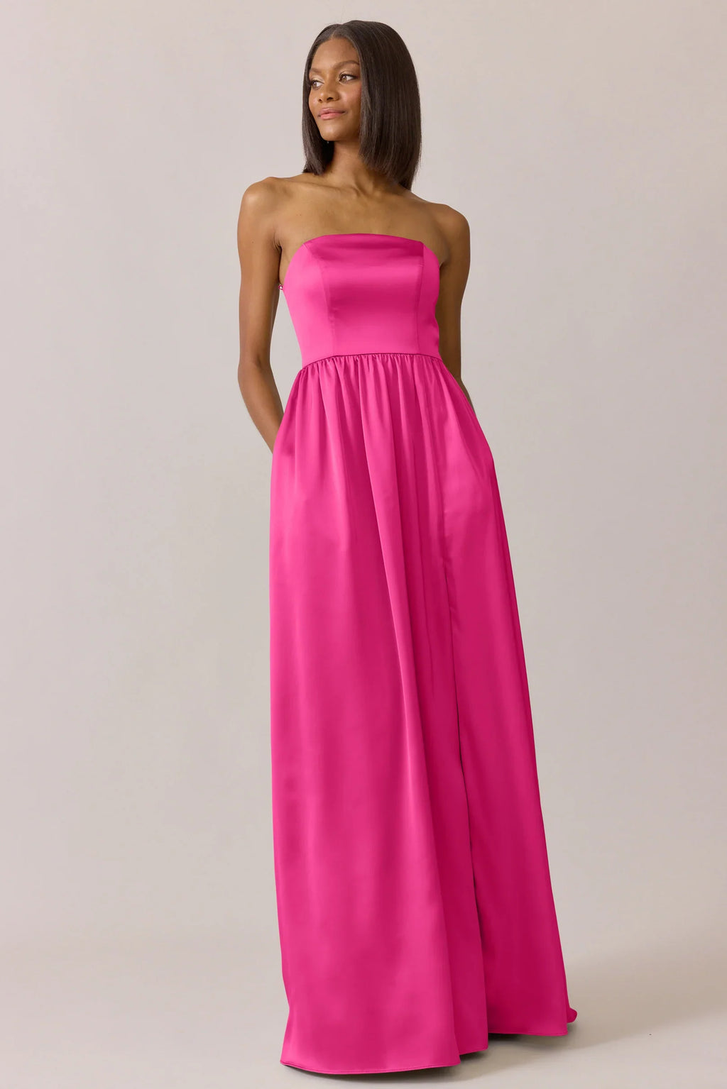 Chic Strapless Square Neck Hot Pink Satin Bridesmaid Dress with Empire Waist, Hidden Pockets & Flowy A-Line Floor-Length Hem