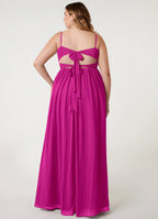 Chiffon bridesmaid dress with spaghetti straps, twist front, back bow tie, and high slit