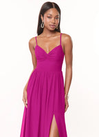 Chiffon bridesmaid dress with spaghetti straps, twist front, back bow tie, and high slit