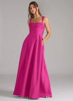 Classic fuchsia satin bridesmaid dress with square neck, wide straps, open back, side pockets and A-line skirt
