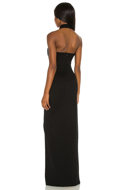 Robe de bal longue dramatique avec décolleté dos nu croisé, sans manches, découpes à l'avant et fente haute