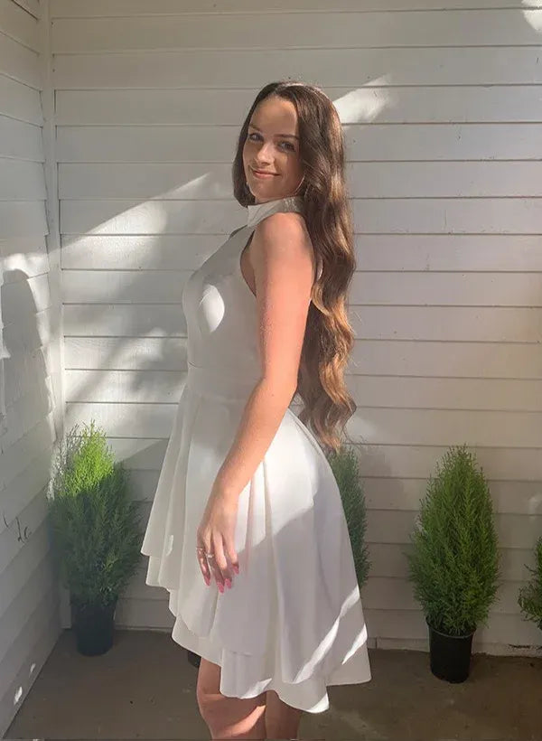 White A-Line Halter Neck Sleeveless Pleated Asymmetrical Hem Mini Homecoming Dress