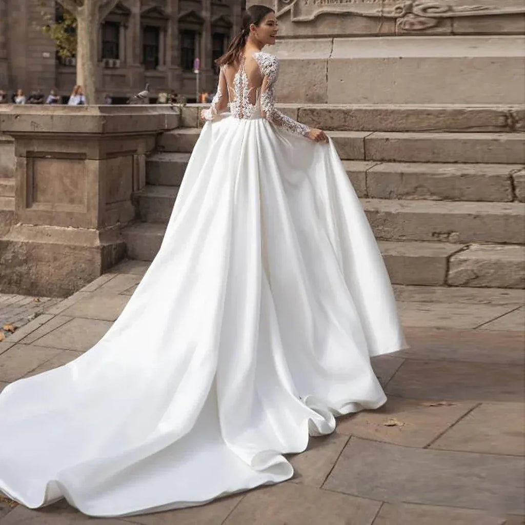 A-Line High Neck Long Sleeve Appliqué Backless Wedding Dress