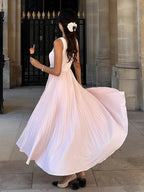 Robe de soirée élégante longue sans manches avec col carré, coupe trapèze et fermeture éclair au dos