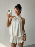 Ivory A-Line Halter Ruched Backless Mini Homecoming Dress With Bubble Hem