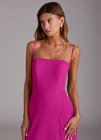 Fuchsia crepe bridesmaid dress with spaghetti straps, square neck, and side slit