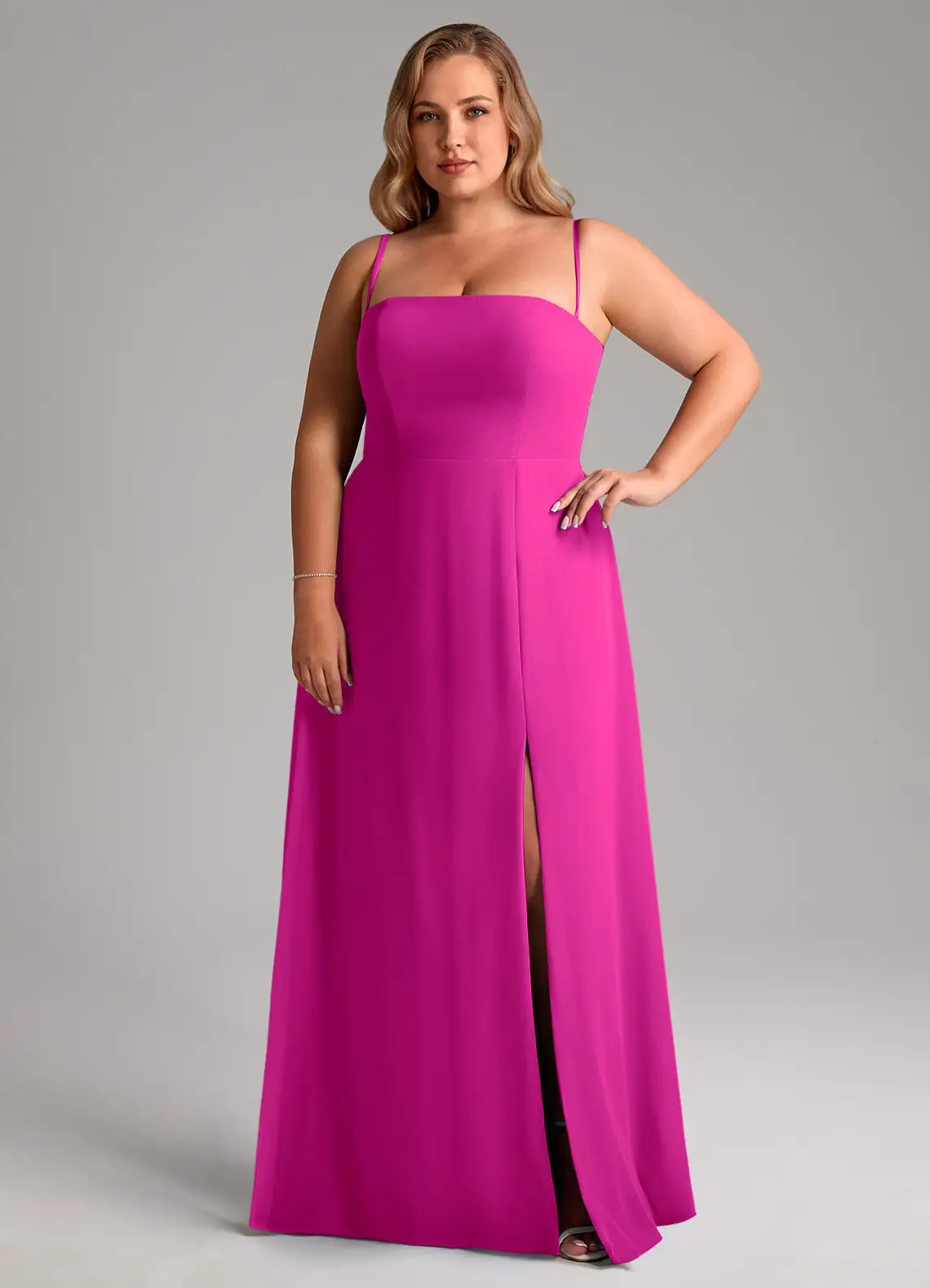 Fuchsia crepe bridesmaid dress with spaghetti straps, square neck, and side slit