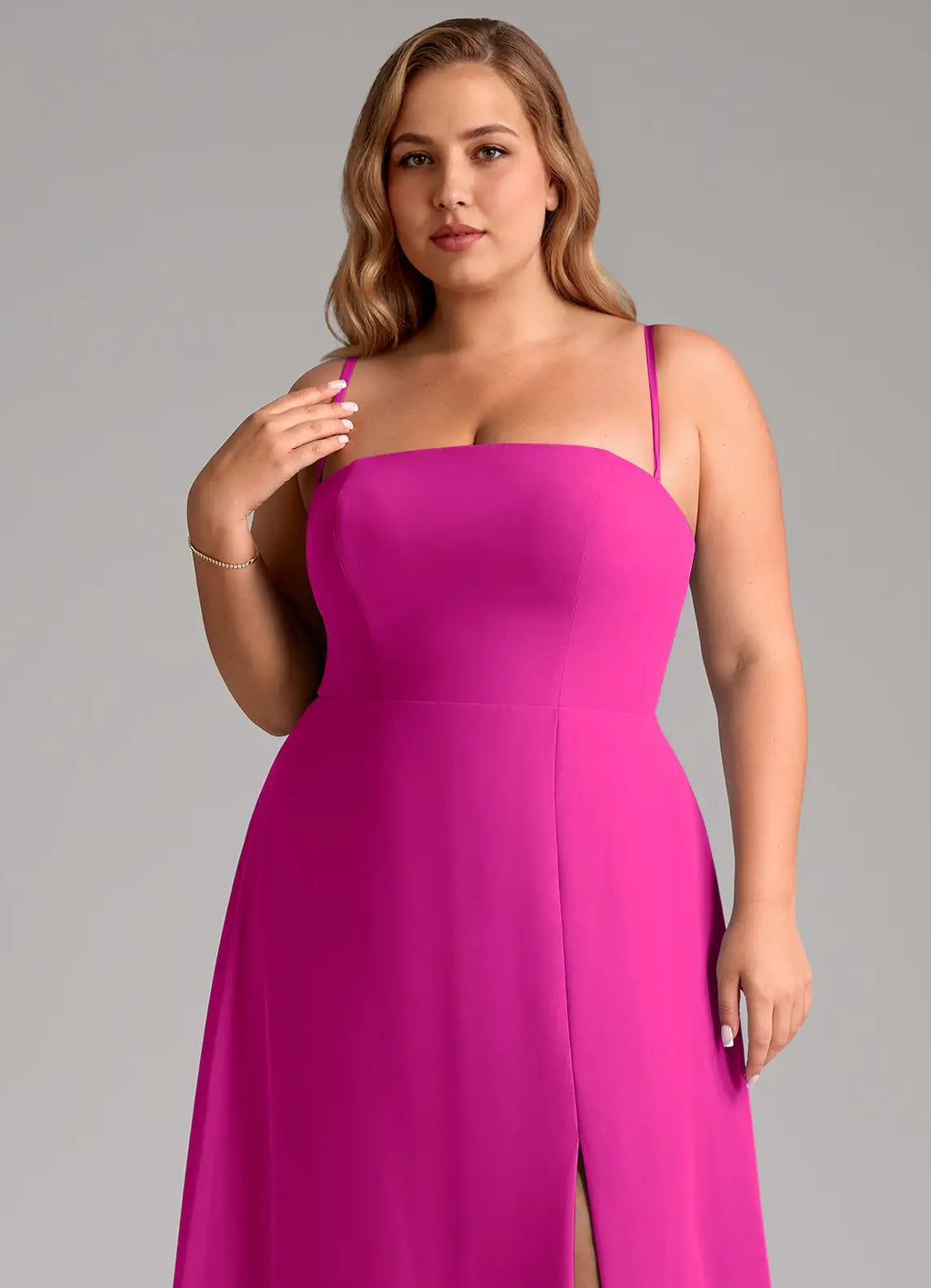 Fuchsia crepe bridesmaid dress with spaghetti straps, square neck, and side slit