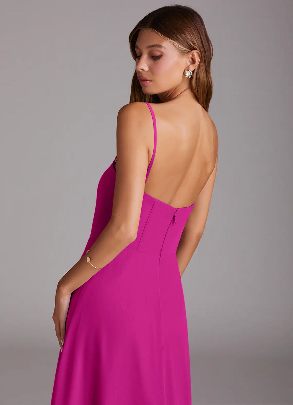 Fuchsia crepe bridesmaid dress with spaghetti straps, square neck, and side slit