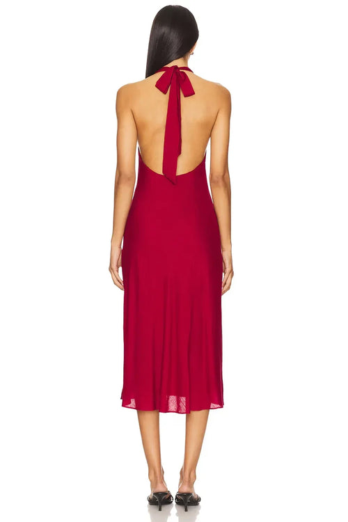 Robe de soirée chic fourreau mi-longue sans manches à licou et dos noué