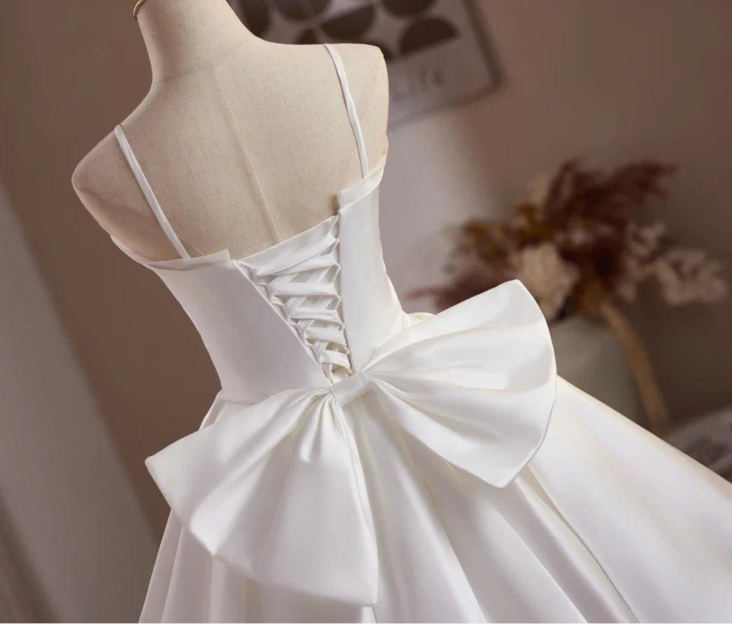 White A-Line Spaghetti Straps Bow-Back Mini Homecoming Dresses