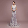 Lavender Mermaid Prom Dress With Lace Appliques Round Neck Cap Sleeve Illusion Bodice Train For Prom Goers