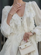 Ivory Romantic A-Line V-Neck Long Sleeves Ruffle Tie Mini Homecoming Dress