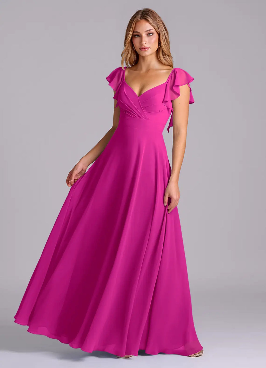 Ruffle sleeve chiffon bridesmaid dress with sweetheart neck, ruched bust, and open back