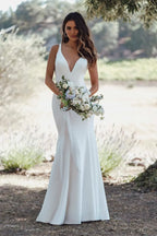Striking Trumpet Plunging V Neck Sleeveless Cowl Back Floor Length Wedding Dress