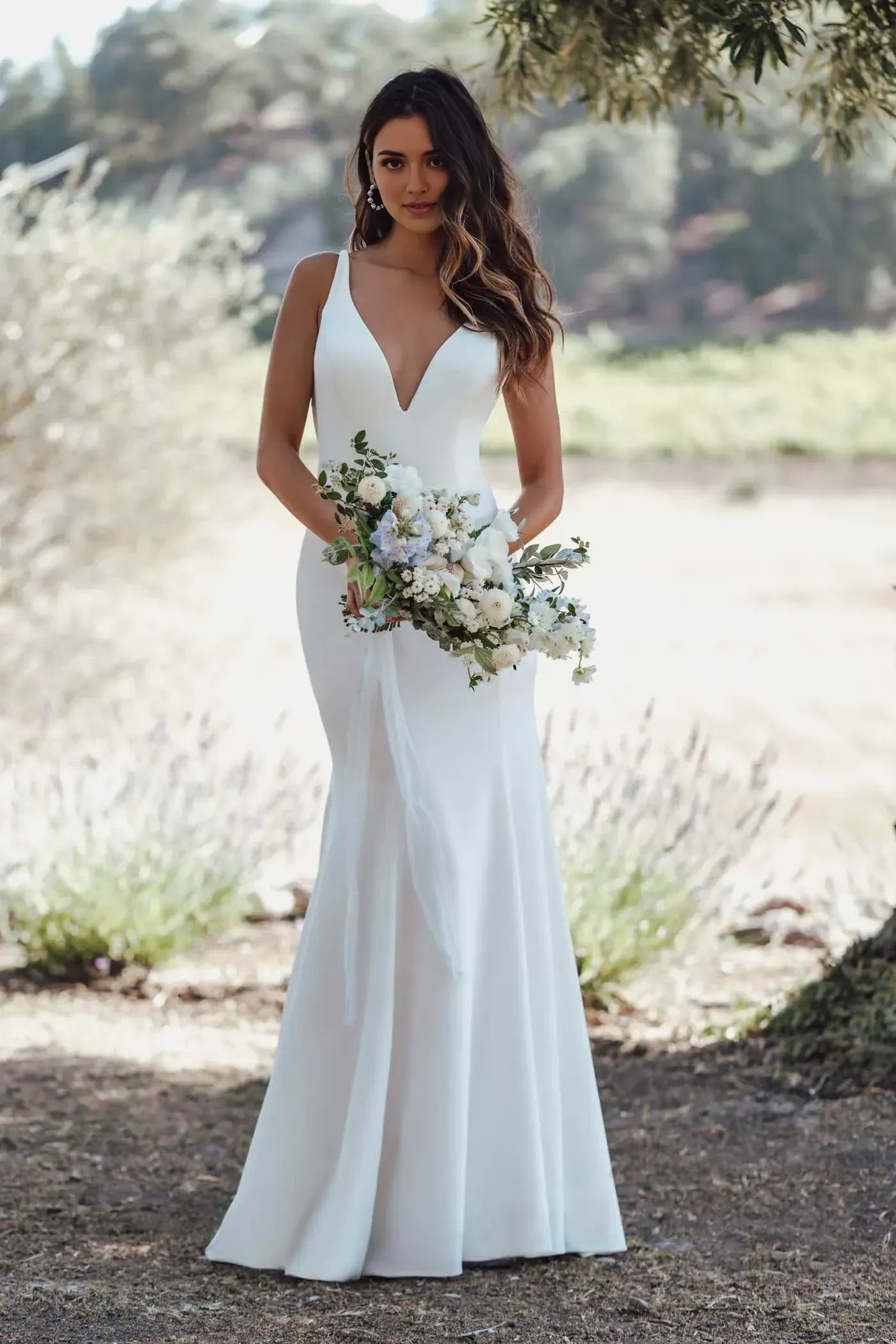 Striking Trumpet Plunging V Neck Sleeveless Cowl Back Floor Length Wedding Dress