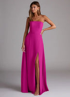 Sleek fuchsia strapless bridesmaid dress with open back, high slit and A-line skirt