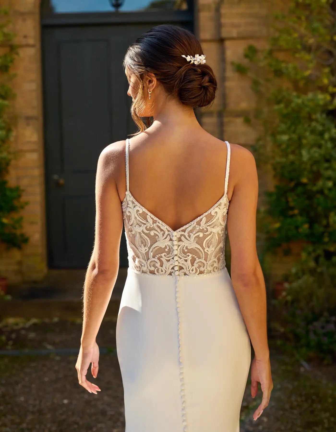 a crepe wedding dress with illusion back