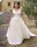 a floral lace a-line wedding dress