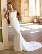 a low back crepe sheath gown