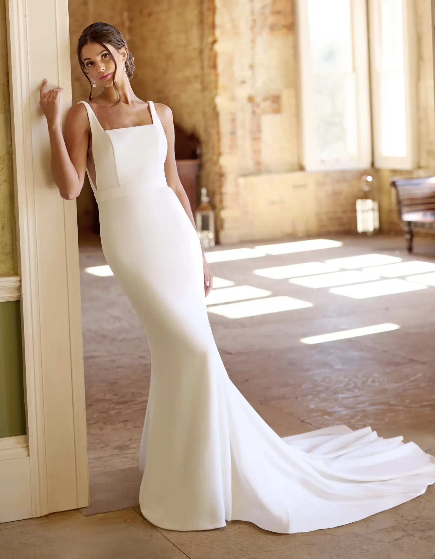 a low back crepe sheath gown