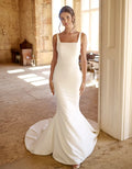 a low back crepe sheath gown