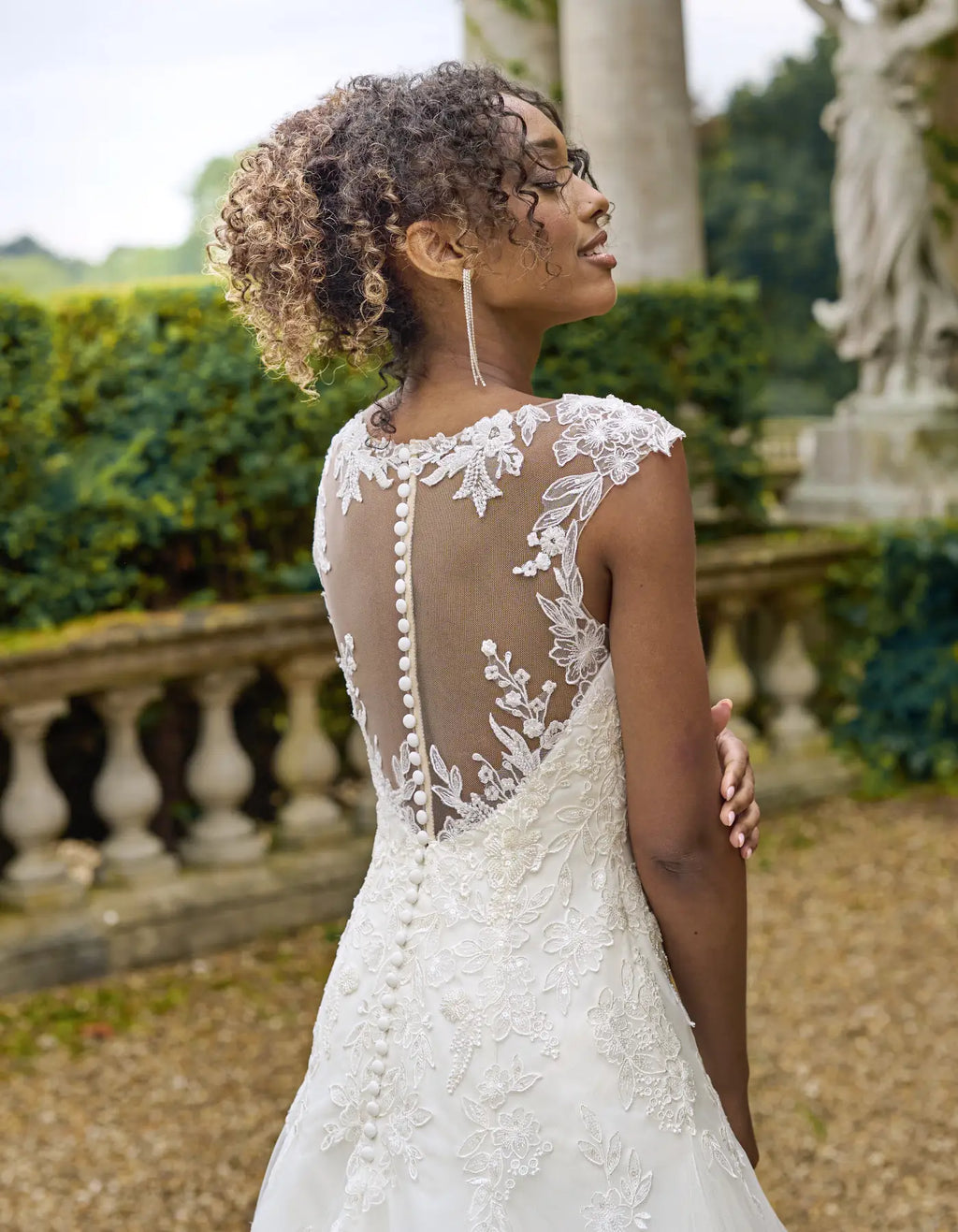 a beaded floral fit & flare wedding dress