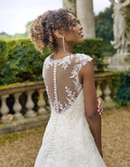 a beaded floral fit & flare wedding dress